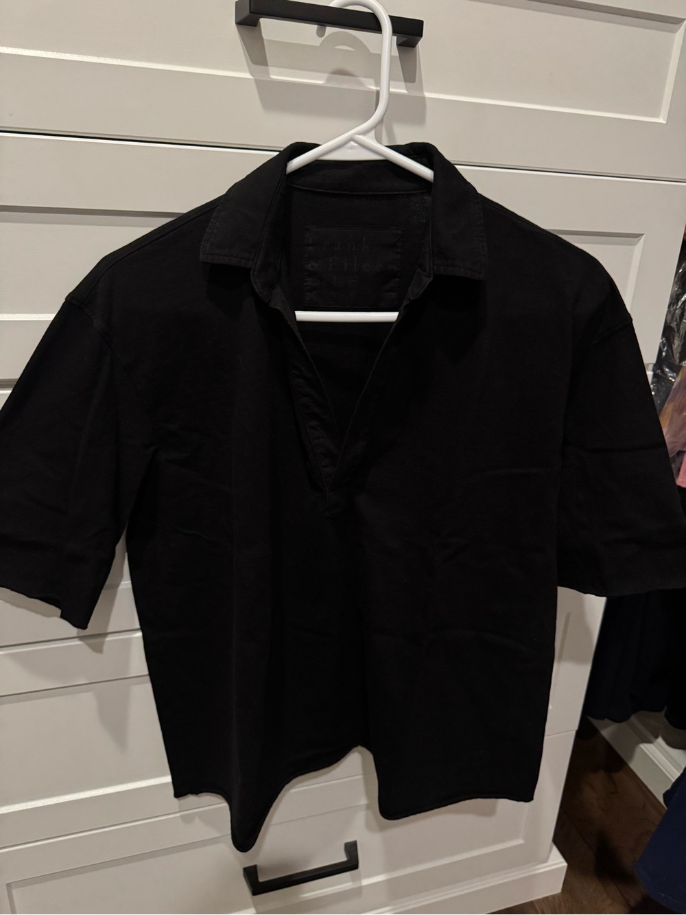 Women’s Black Short-Sleeve Polo Shirt size small